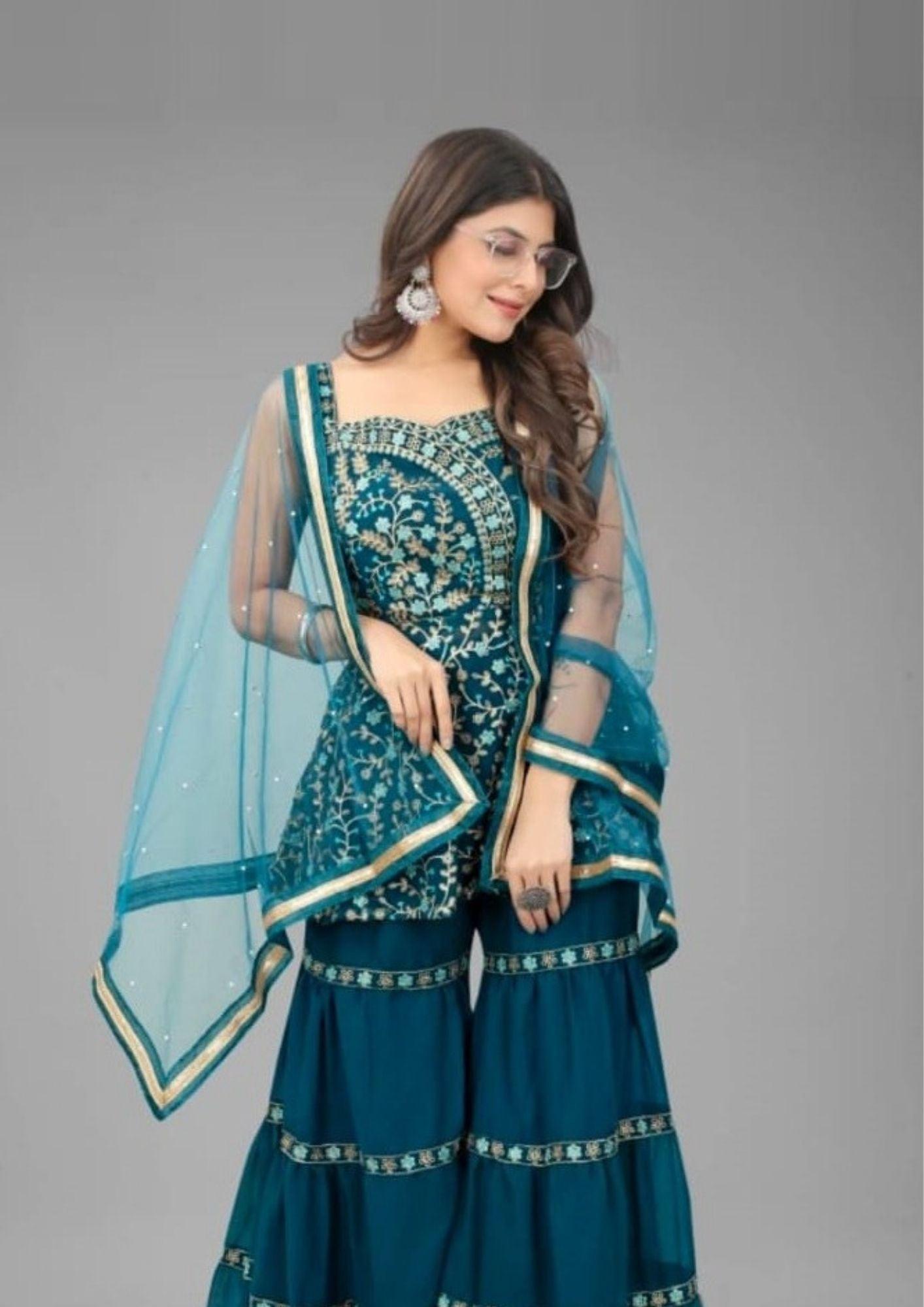 Nivantra Exquisite Rama Sharara Embroidery Work – Handcrafted Stitched Designs, Traditional and Elegant Craftsmanship for a Unique Fashion Statement.