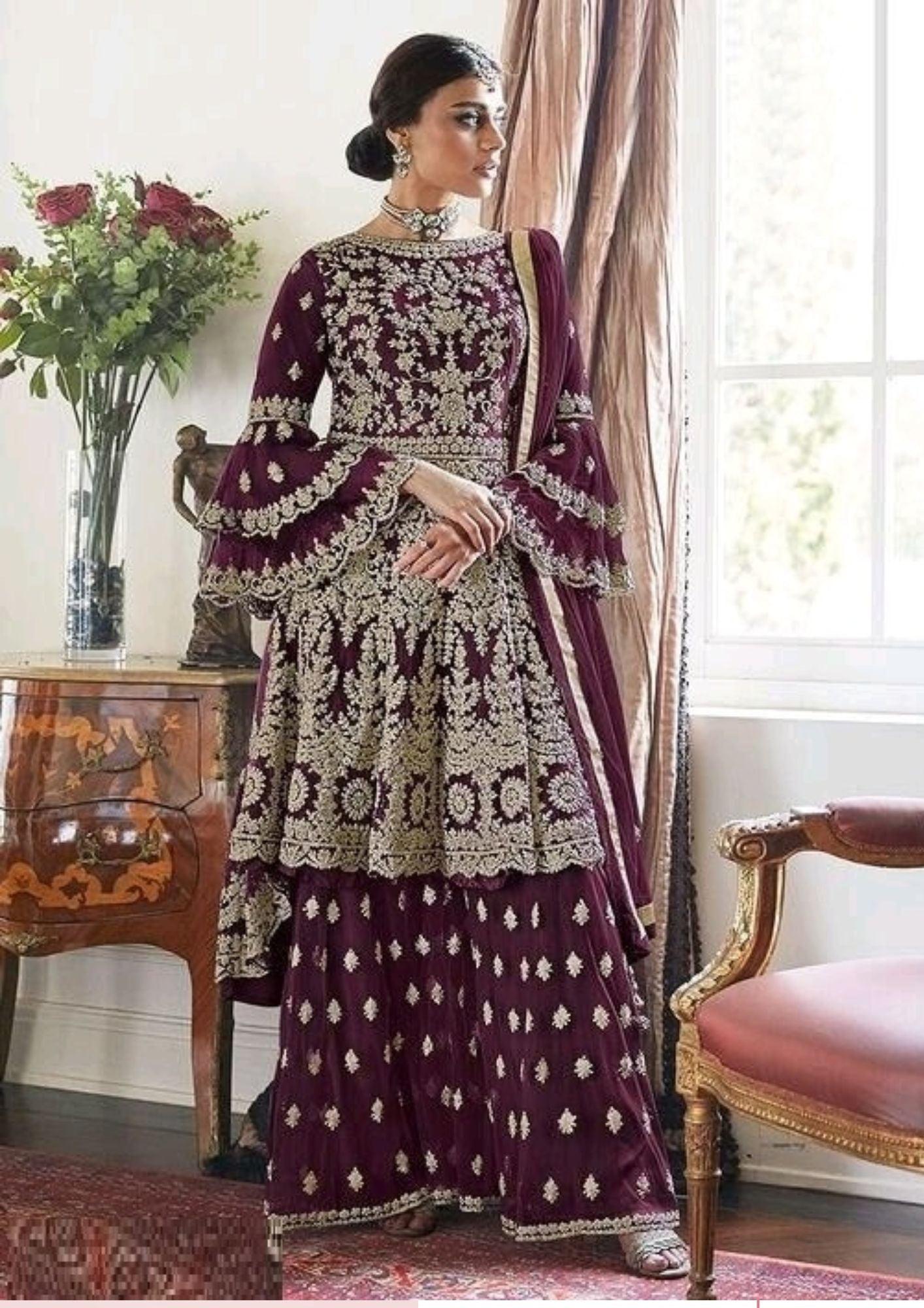 Nivantra Elegant Purple Sharara Suit with Butterfly Net and Intricate Embroidery
