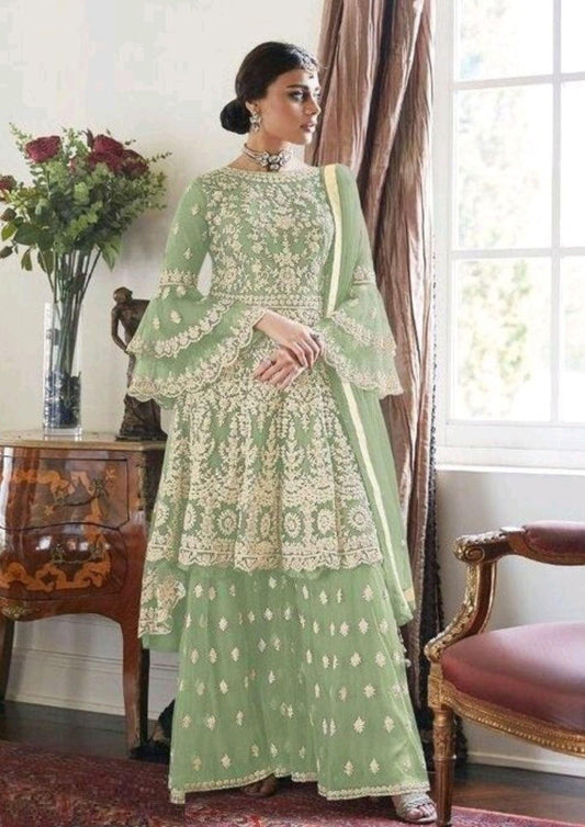 Nivantra Radiant Pista Green Sarara for Bridal and Festive Wear